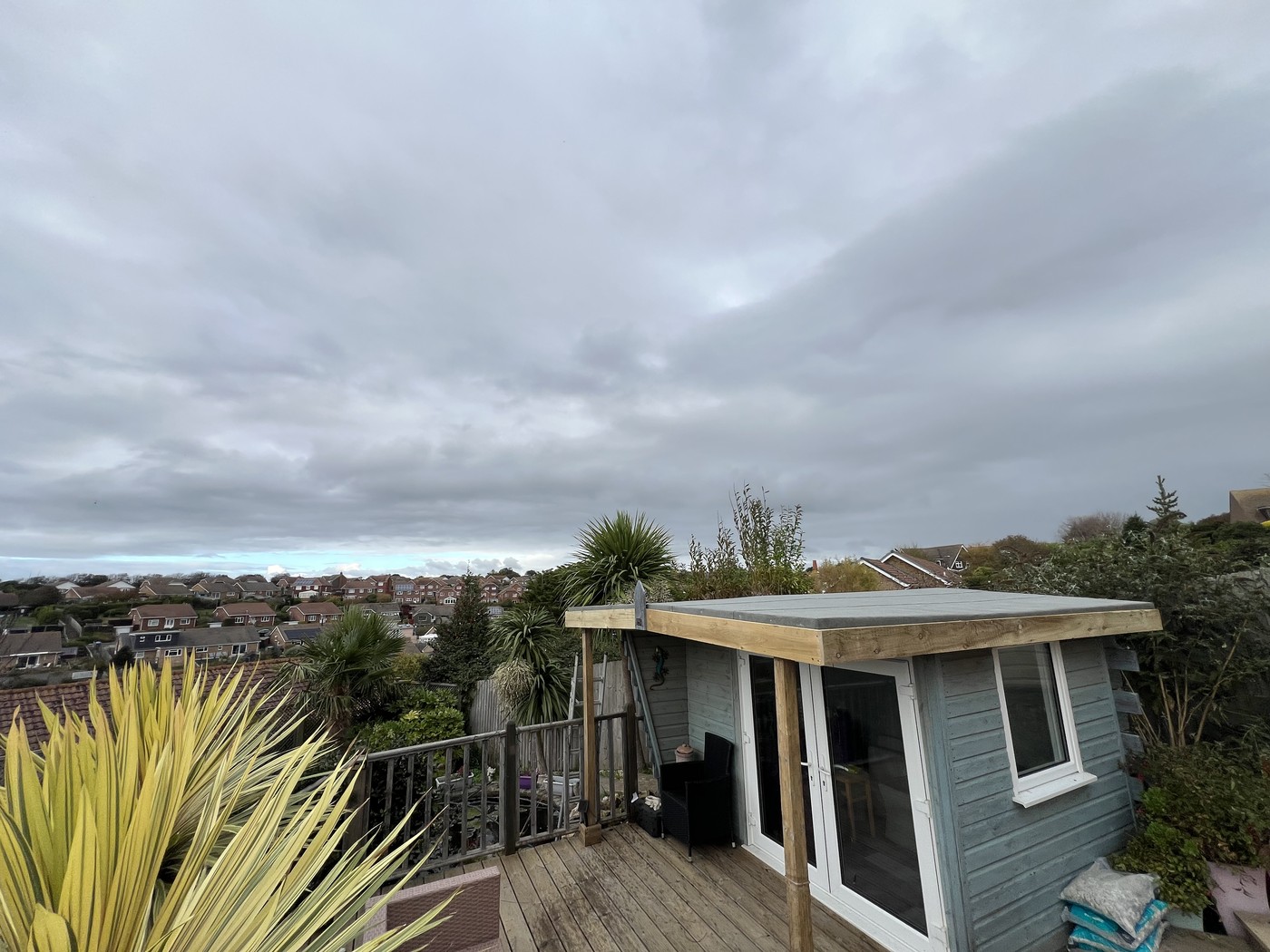 Coastal garden and raised deck in Sussex